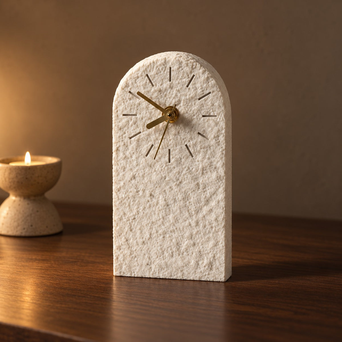 Arch Sandstone Desk Clock in white on a walnut table