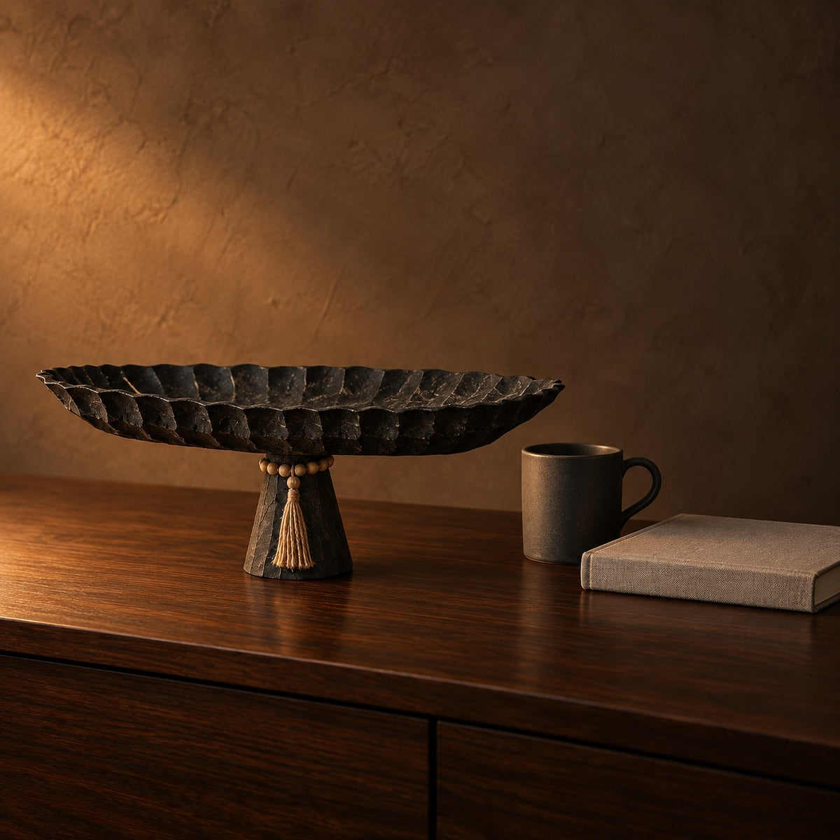 Black Pedestal Tray beside a coffee mug and a hardcover book, showing its 45 cm length