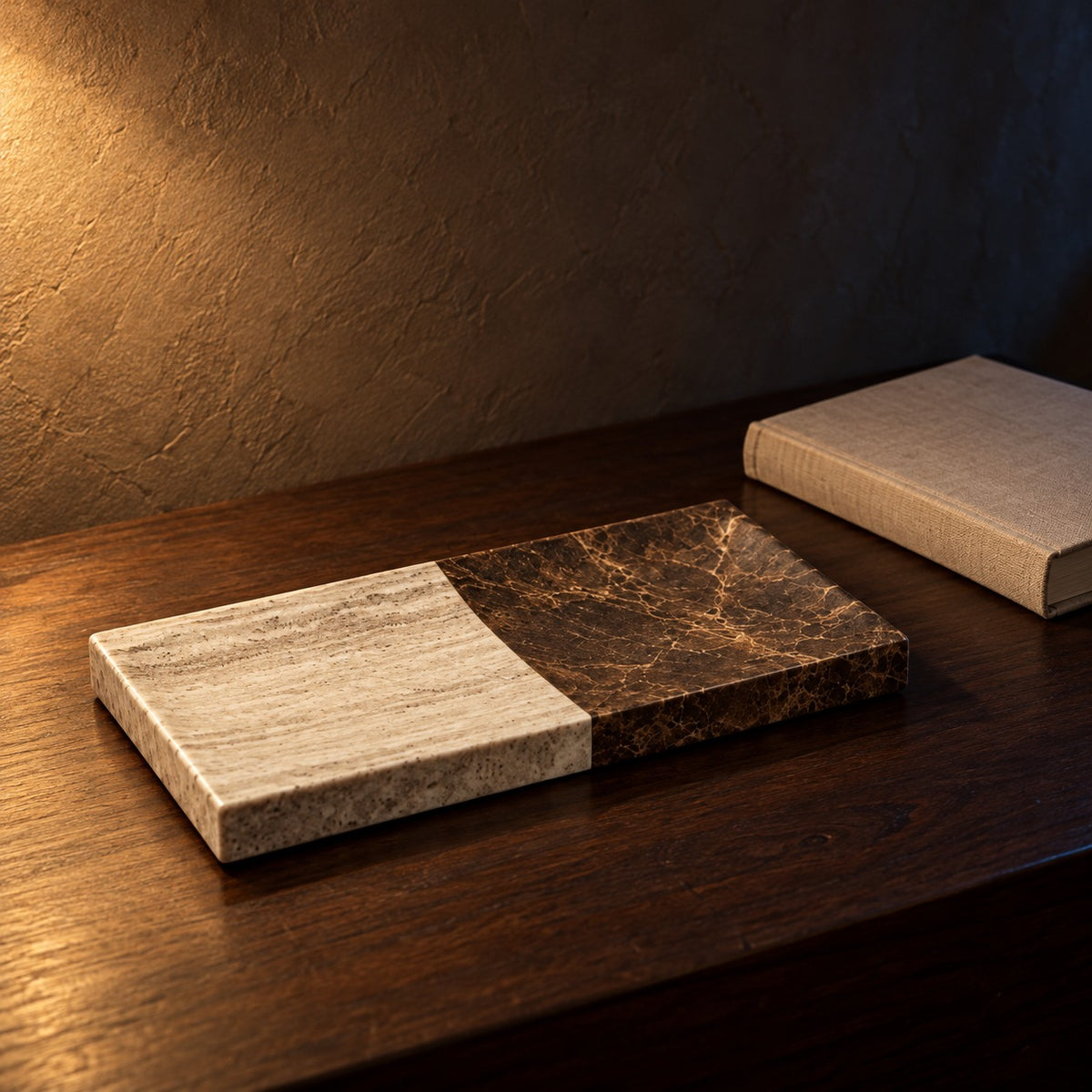 Marble vanity tray next to a hardcover book for size