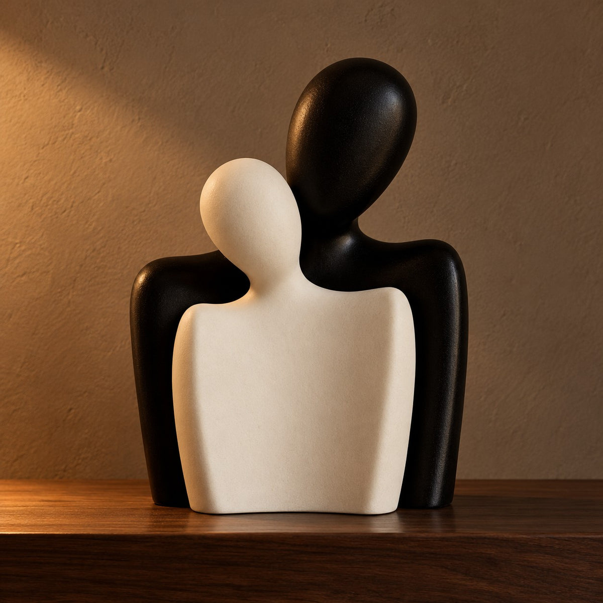 Embrace ceramic bust sculpture pair, black and cream