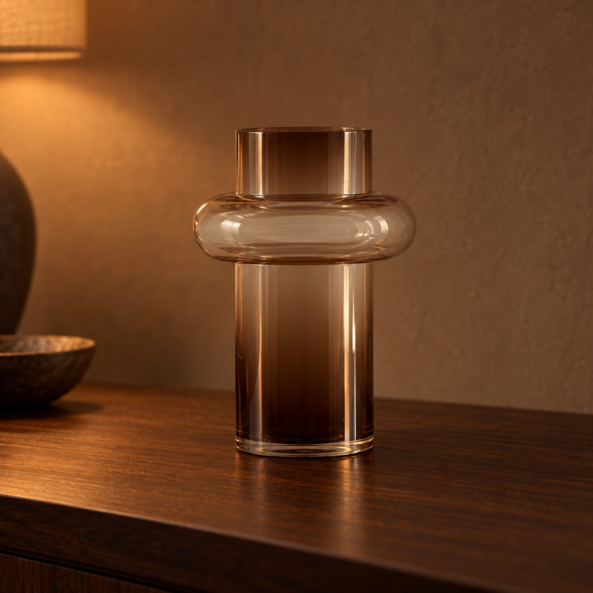 Smoked Halo Glass Vase close up on a walnut console