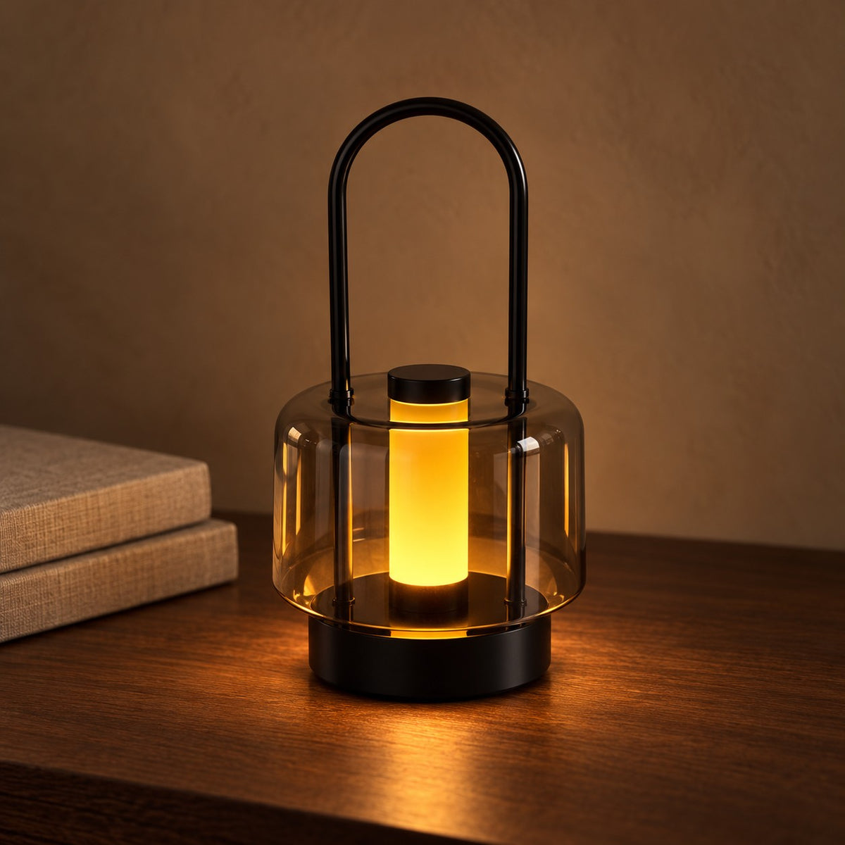Black Dusk lantern lamp glowing warm on a walnut table
