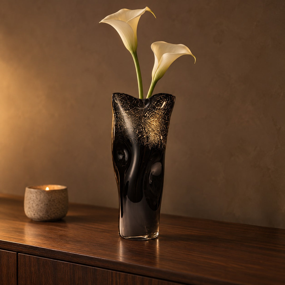 Noir Gilt black and gold glass vase, tall, with calla lilies