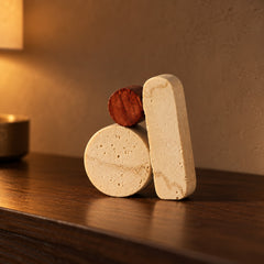 Balanced Stack Ceramic Sculpture close up on a walnut console