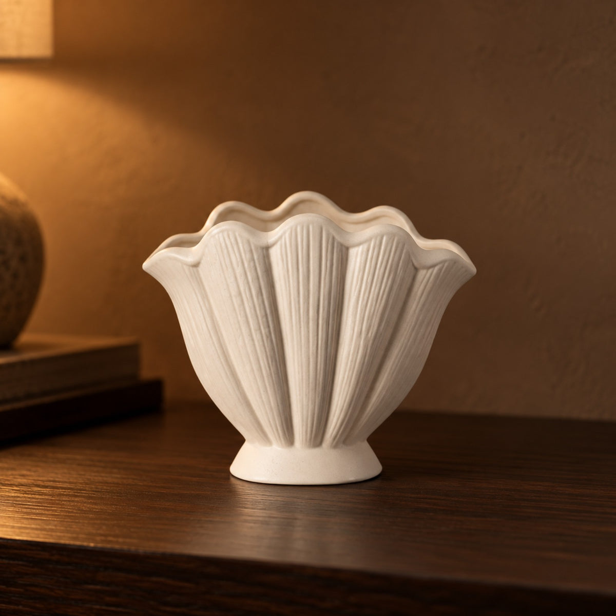 Scallop Shell Ceramic Vase close up on a walnut console