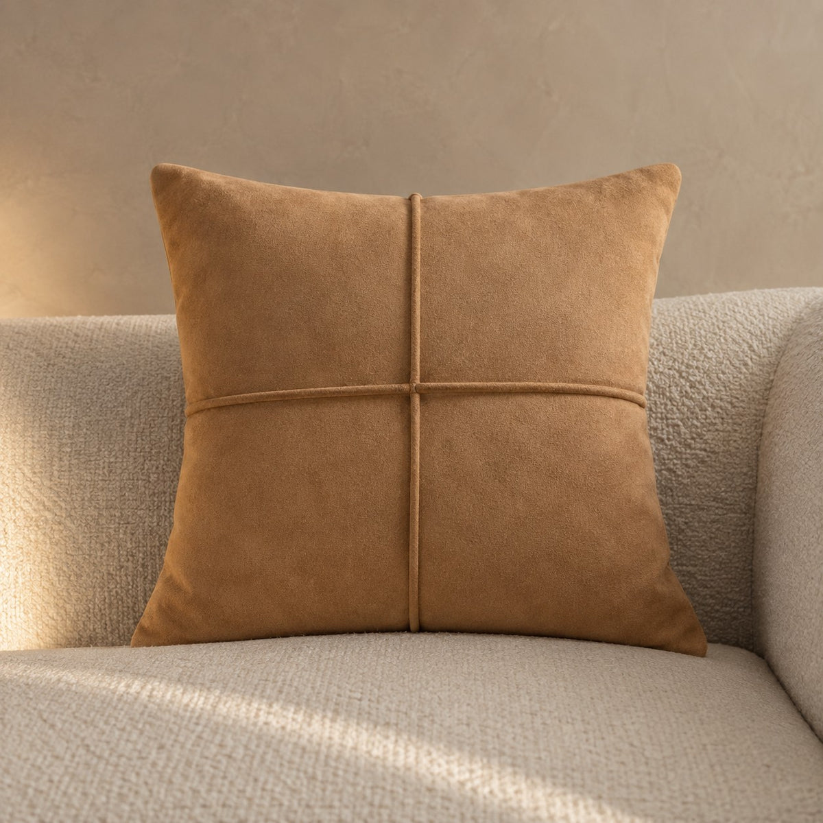 Tan suede touch cushion with stitched cross seam